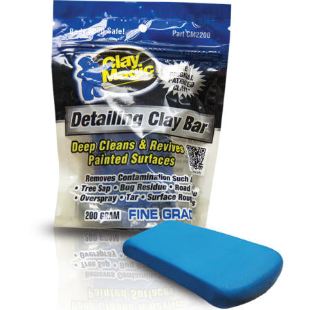 Clay Magic detailing clay bar packaging with a blue clay bar on a white background